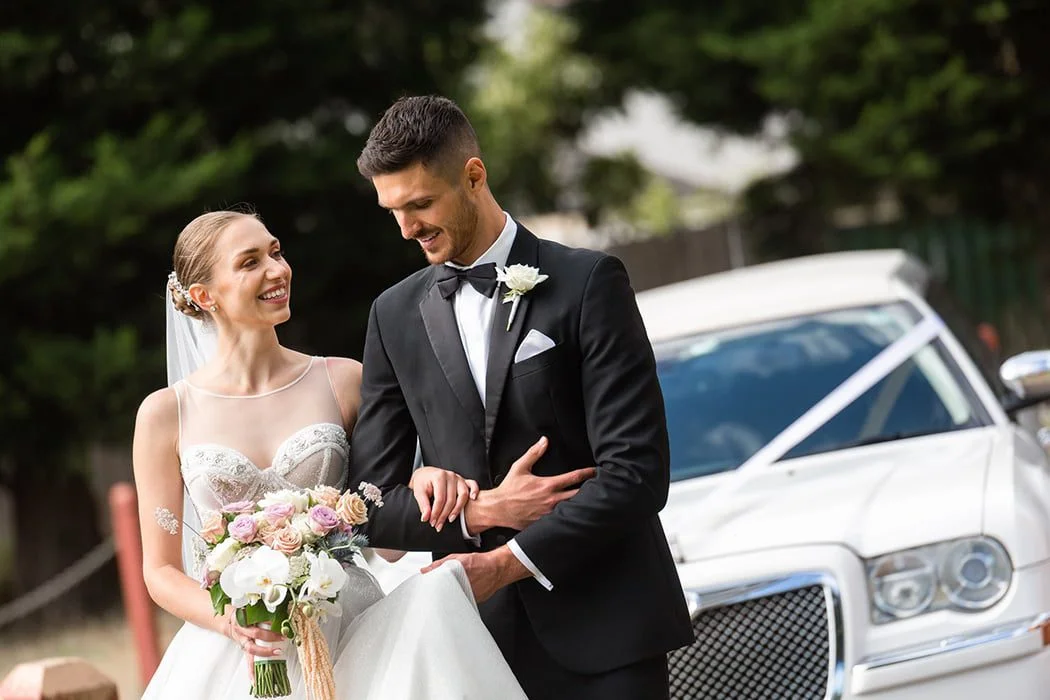 Bride and groom among greenery and trees in a Melbourne garden