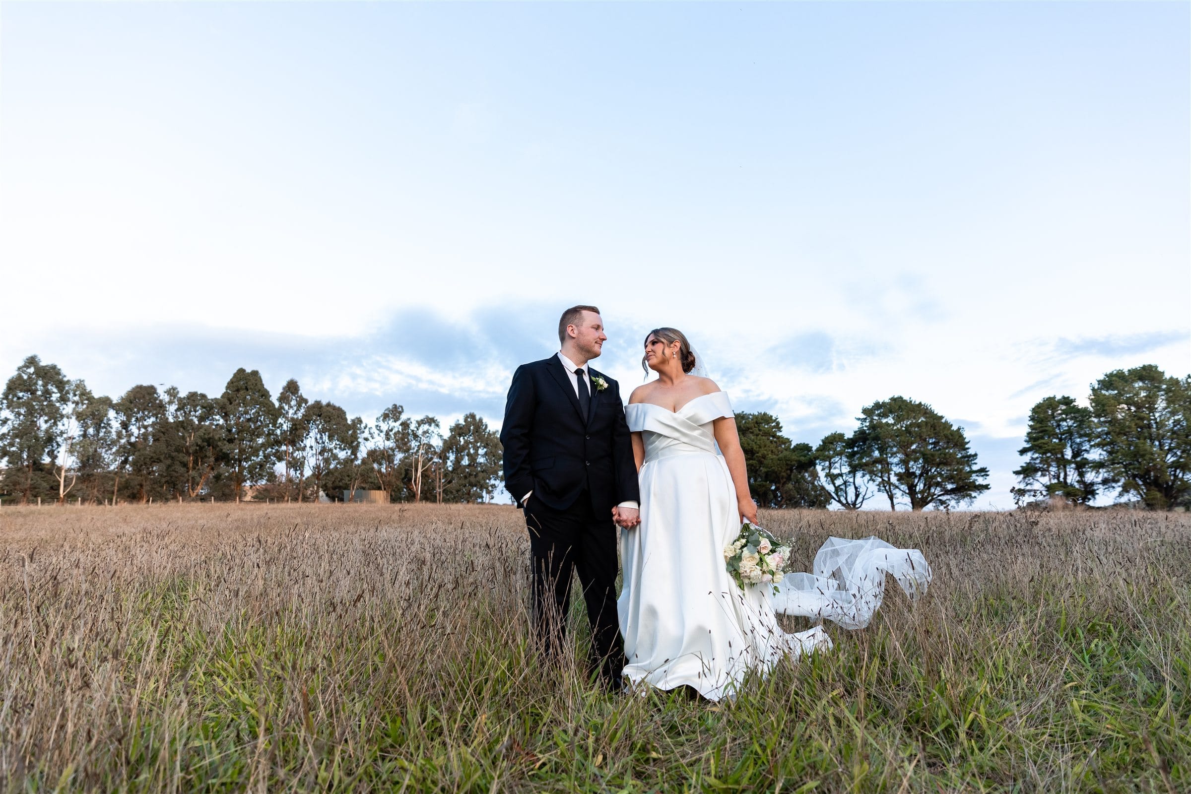 Couple portrait among vines at a Yarra Valley wedding