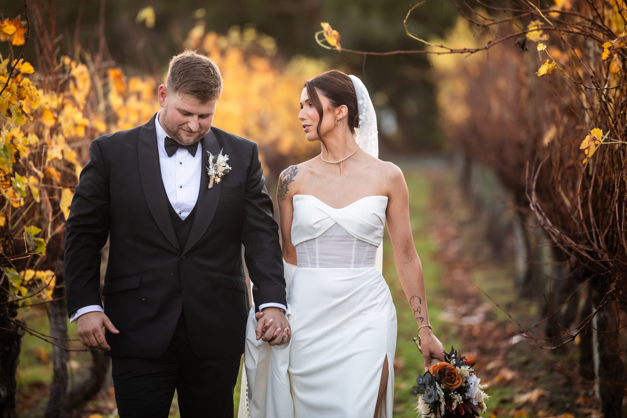 Relaxed couple portrait at Immerse Winery in the Yarra Valley