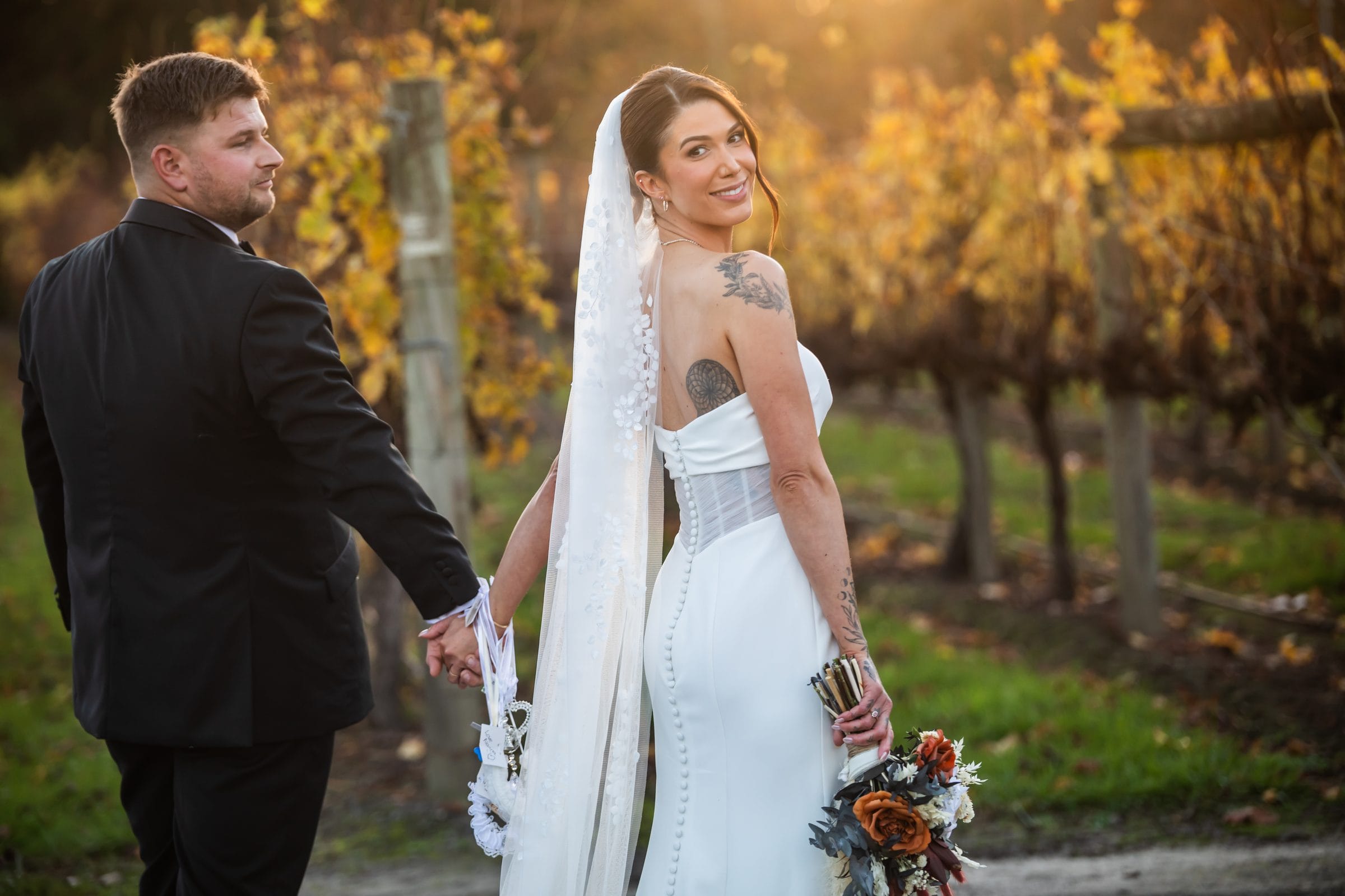 Newlyweds among the vines at Immerse Winery in Dixons Creek